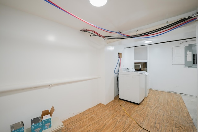 72 Harral Ave, Bridgeport, CT 06604 - laundry room with independent washer and dryer, electric panel, and light wood-style floors