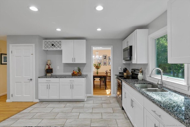330 Foxwood Rd, Guilford, CT 06437 - kitchen with appliances with stainless steel finishes, dark stone countertops, white cabinets, and recessed lighting