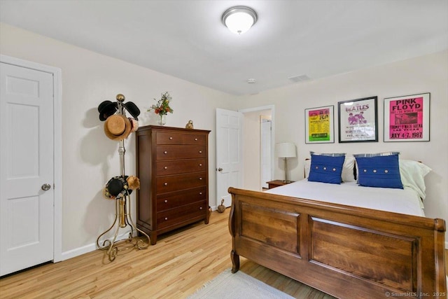 330 Foxwood Rd, Guilford, CT 06437 - bedroom with light wood-type flooring and baseboards