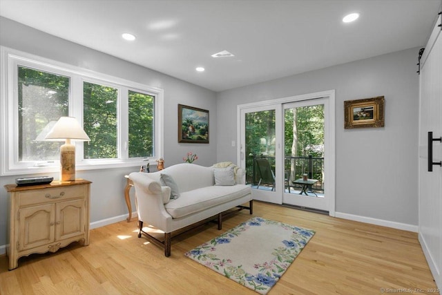 330 Foxwood Rd, Guilford, CT 06437 - sitting room with plenty of natural light, light wood finished floors, and recessed lighting