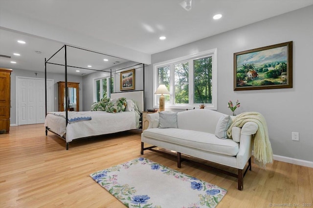 330 Foxwood Rd, Guilford, CT 06437 - bedroom with multiple windows, light wood-style flooring, and recessed lighting
