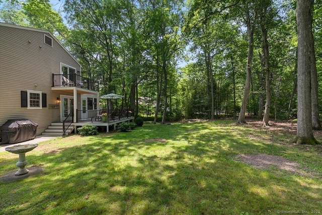330 Foxwood Rd, Guilford, CT 06437 - view of grassy yard featuring a balcony and a wooden deck