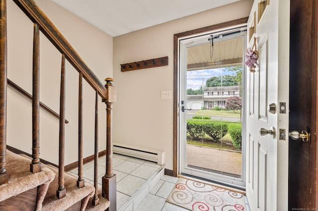 66 Claire St, Bristol, CT 06010 - entrance foyer featuring a baseboard heating unit, light tile patterned floors, and stairs