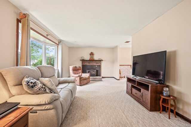66 Claire St, Bristol, CT 06010 - living area with light carpet and a fireplace