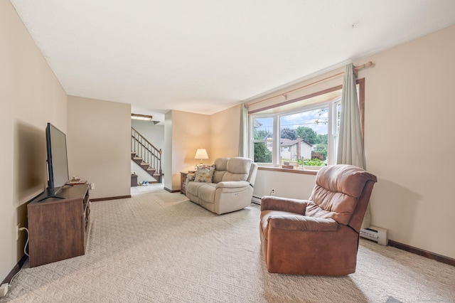 66 Claire St, Bristol, CT 06010 - living room featuring a baseboard heating unit, light carpet, and stairs