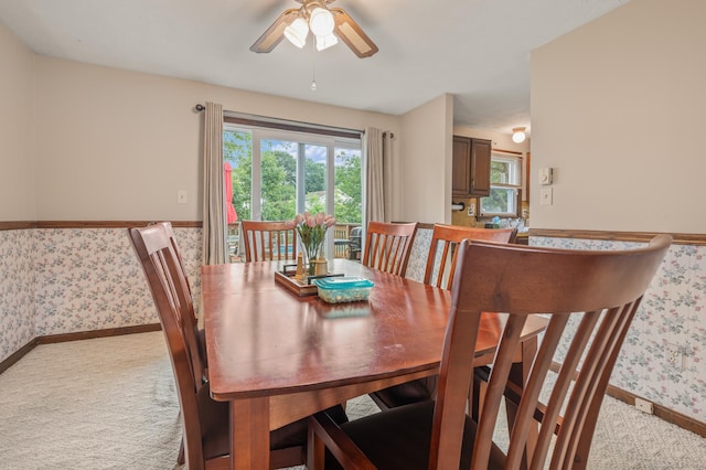 66 Claire St, Bristol, CT 06010 - dining area with light colored carpet, wallpapered walls, a ceiling fan, and plenty of natural light
