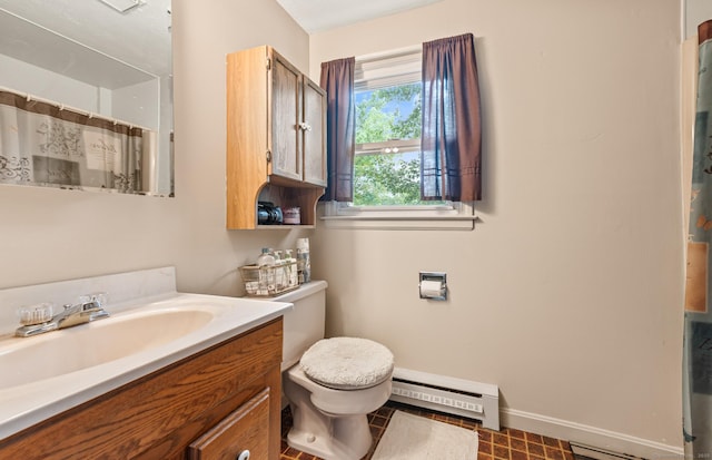 66 Claire St, Bristol, CT 06010 - bathroom featuring baseboard heating, vanity, and a shower with shower curtain