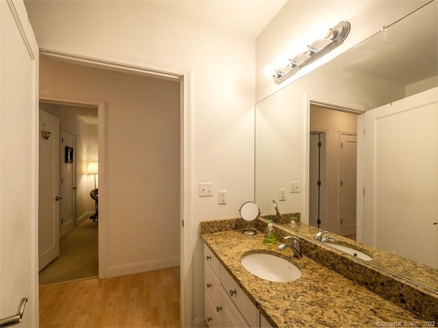 124 Court St Unit 8, New Haven, CT 06511 - bathroom with wood finished floors and vanity