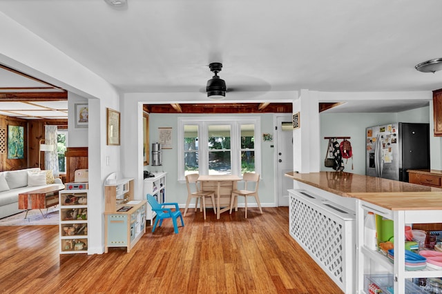 191 Farrell Rd, Waterbury, CT 06706 - kitchen with stainless steel refrigerator with ice dispenser, light wood-style flooring, and ceiling fan