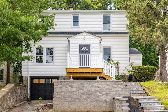 21 Whittlesey Ave, Waterbury, CT 06706 - view of front of property with an attached garage