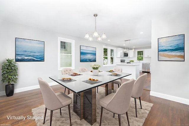 21 Whittlesey Ave, Waterbury, CT 06706 - dining area featuring dark wood-style flooring, a chandelier, and recessed lighting