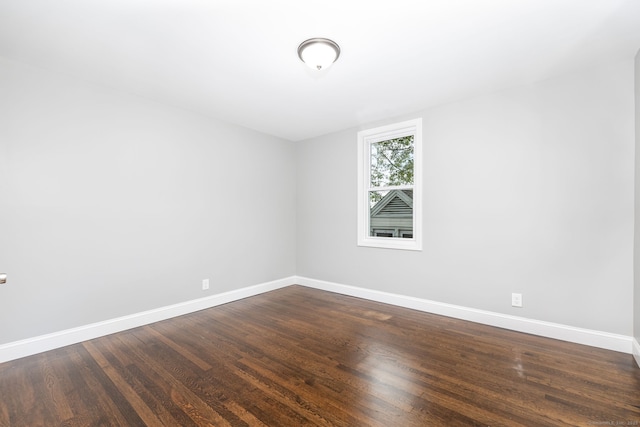 21 Whittlesey Ave, Waterbury, CT 06706 - unfurnished room featuring baseboards and dark wood finished floors