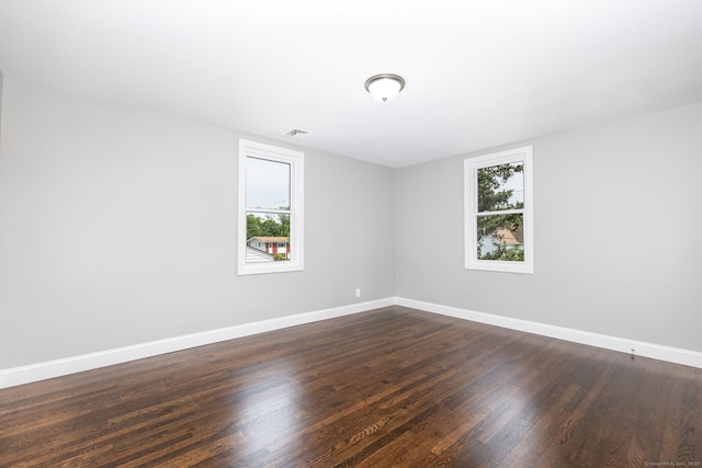 21 Whittlesey Ave, Waterbury, CT 06706 - unfurnished room with dark wood-style flooring