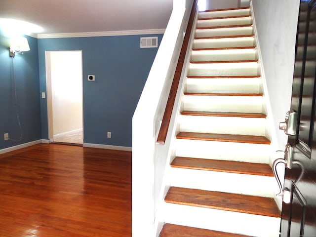 155 Sylvan Knoll Rd, Stamford, CT 06902 - stairs featuring ornamental molding and wood finished floors