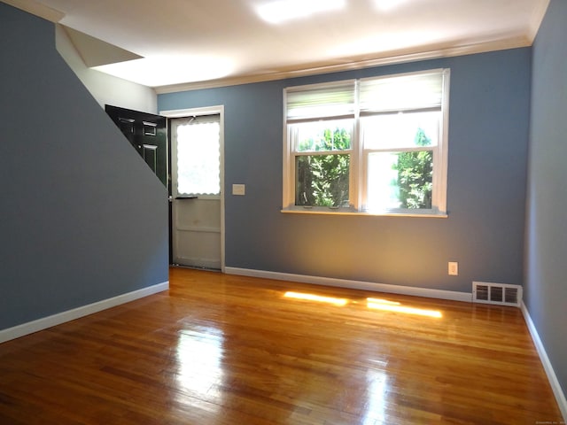 155 Sylvan Knoll Rd, Stamford, CT 06902 - spare room featuring wood finished floors and crown molding
