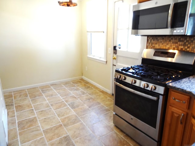 155 Sylvan Knoll Rd, Stamford, CT 06902 - kitchen featuring appliances with stainless steel finishes, backsplash, and brown cabinetry