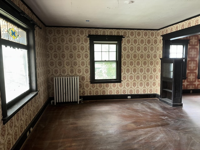 607 Broadview Ter, Hartford, CT 06106 - unfurnished room with radiator heating unit and wallpapered walls