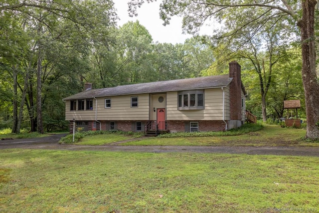 76 Bushy Hill Rd, Deep River, CT 06417 - split foyer home with a chimney and a front yard
