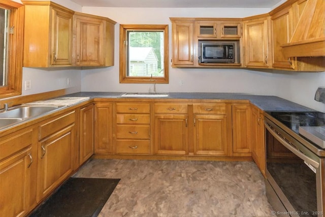 76 Bushy Hill Rd, Deep River, CT 06417 - kitchen with stainless steel appliances, custom range hood, brown cabinets, and glass insert cabinets