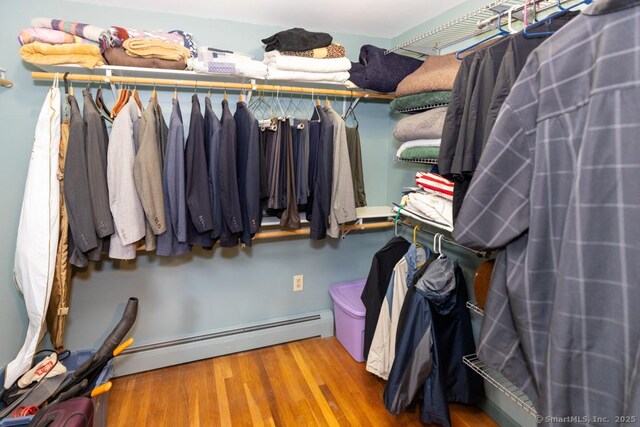 76 Bushy Hill Rd, Deep River, CT 06417 - spacious closet with a baseboard radiator and wood finished floors
