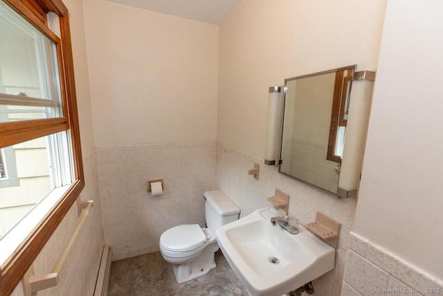 76 Bushy Hill Rd, Deep River, CT 06417 - half bath featuring tile walls, healthy amount of natural light, a baseboard heating unit, and wainscoting