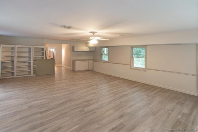 76 Bushy Hill Rd, Deep River, CT 06417 - unfurnished living room with a ceiling fan and light wood-type flooring