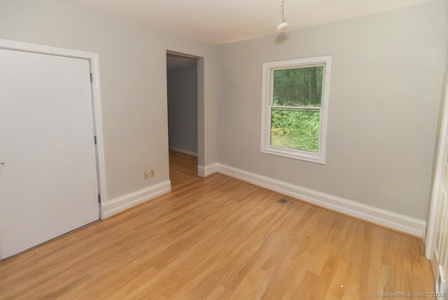 76 Bushy Hill Rd, Deep River, CT 06417 - unfurnished room with baseboards and light wood-style floors
