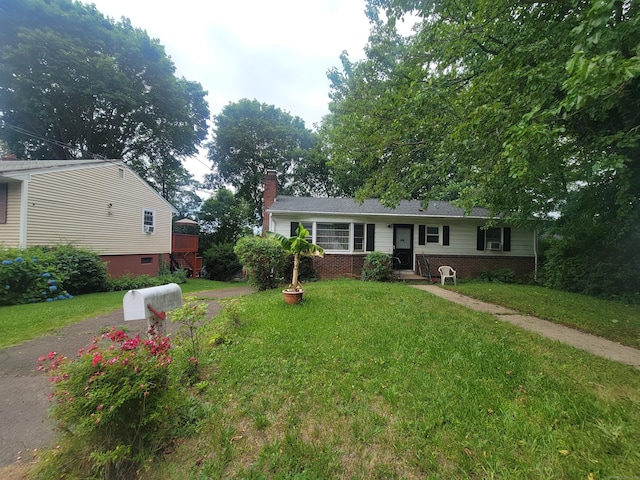 360 Kneeland Rd, New Haven, CT 06512 - ranch-style house featuring a chimney, a front yard, and brick siding