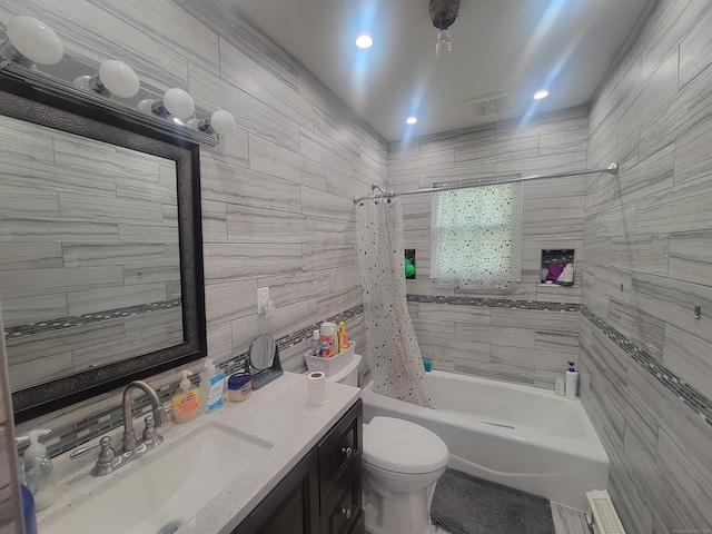 360 Kneeland Rd, New Haven, CT 06512 - bathroom with tile walls, shower / tub combo, vanity, and recessed lighting