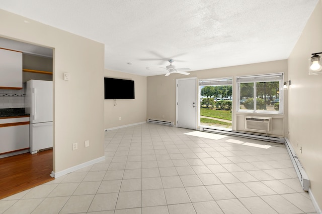 101 W Walk Unit 101, West Haven, CT 06516 - unfurnished living room with baseboard heating, ceiling fan, a textured ceiling, and an AC wall unit