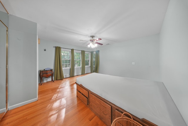 35 Flax Mill Ter, Milford, CT 06461 - bedroom with light wood-style flooring and ceiling fan