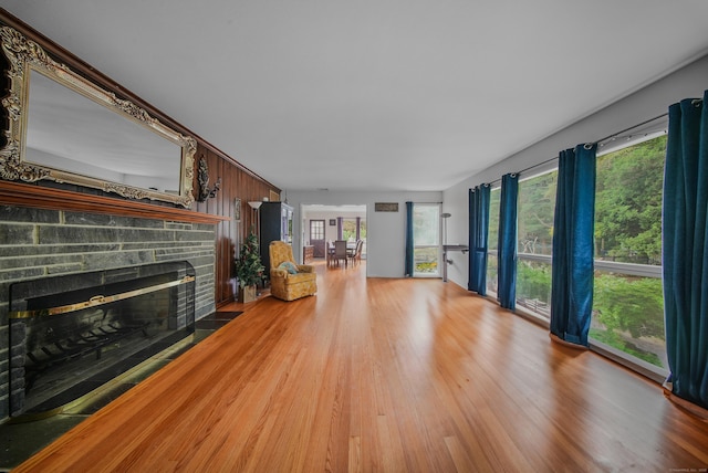 35 Flax Mill Ter, Milford, CT 06461 - unfurnished living room featuring a fireplace and wood finished floors