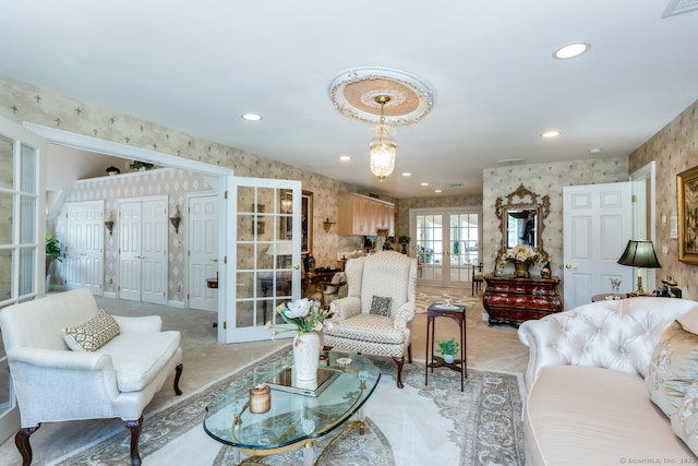 90 Soundview Ave, Shelton, CT 06484 - living area with french doors, wallpapered walls, light colored carpet, and recessed lighting