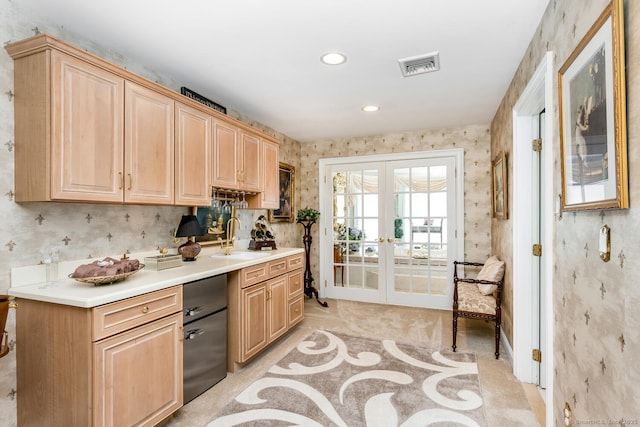 90 Soundview Ave, Shelton, CT 06484 - kitchen with french doors, light brown cabinetry, wallpapered walls, light countertops, and fridge