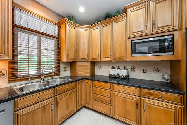 90 Soundview Ave, Shelton, CT 06484 - kitchen featuring stainless steel appliances, brown cabinets, dark stone counters, recessed lighting, and backsplash