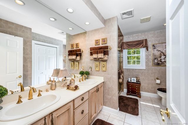 90 Soundview Ave, Shelton, CT 06484 - bathroom featuring tile walls, double vanity, tile patterned flooring, tiled shower, and recessed lighting