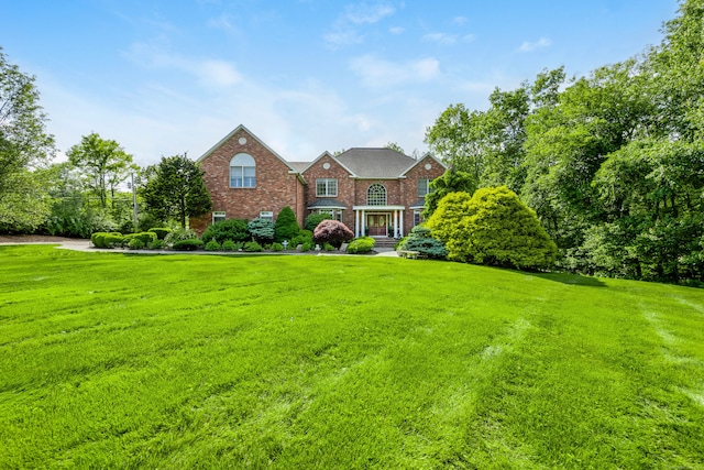 90 Soundview Ave, Shelton, CT 06484 - colonial inspired home with brick siding and a front lawn