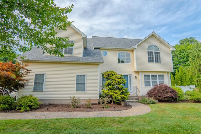 148 Evergreen Rd, Cromwell, CT 06416 - view of front of house with roof with shingles and a front lawn