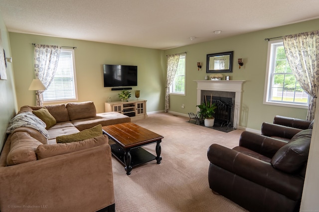 148 Evergreen Rd, Cromwell, CT 06416 - carpeted living room with a fireplace with flush hearth and plenty of natural light