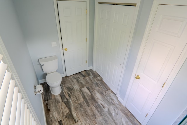 148 Evergreen Rd, Cromwell, CT 06416 - bathroom with toilet and wood finished floors