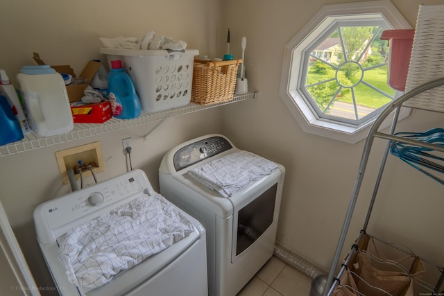 148 Evergreen Rd, Cromwell, CT 06416 - washroom with separate washer and dryer and light tile patterned flooring