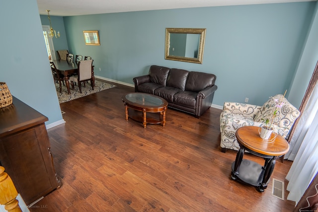 148 Evergreen Rd, Cromwell, CT 06416 - living area featuring a chandelier and wood finished floors