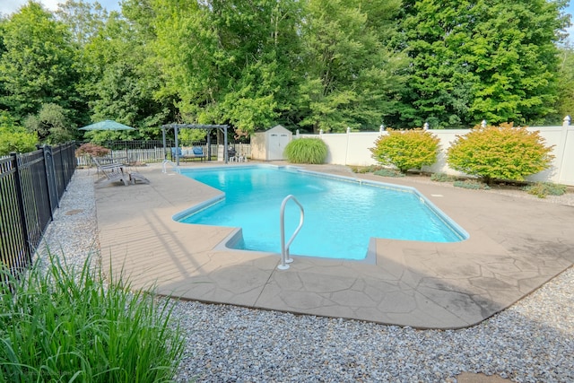 148 Evergreen Rd, Cromwell, CT 06416 - view of swimming pool featuring a fenced backyard, a patio, and a shed