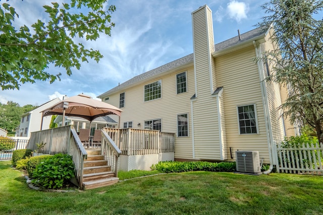 148 Evergreen Rd, Cromwell, CT 06416 - rear view of property featuring a deck and a chimney