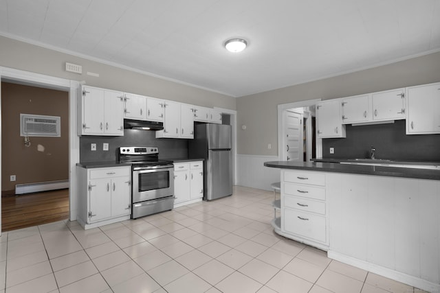 1691 State St, Hamden, CT 06517 - kitchen with stainless steel appliances, a baseboard radiator, under cabinet range hood, a wall unit AC, and dark countertops