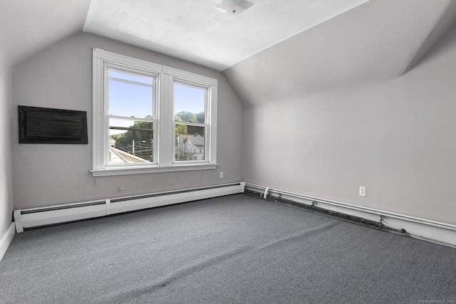1691 State St, Hamden, CT 06517 - additional living space with vaulted ceiling, carpet floors, a baseboard heating unit, and a wall mounted AC