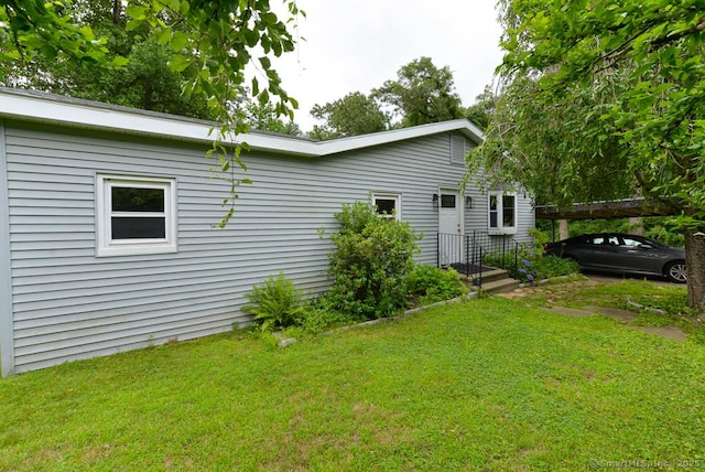 215 White Birch Dr, Southbury, CT 06488 - rear view of property featuring a lawn