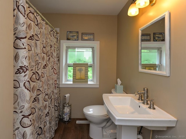 215 White Birch Dr, Southbury, CT 06488 - full bath featuring wood finished floors and a shower with shower curtain