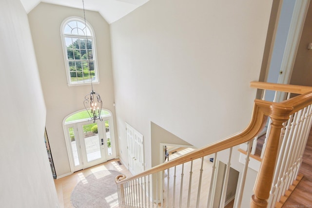 61 Brookview Ct, Groton, CT 06340 - foyer with plenty of natural light, stairway, wood finished floors, and high vaulted ceiling