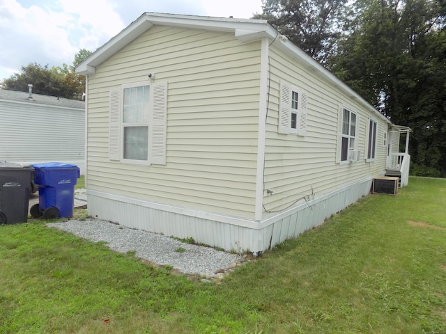 61 Elm St, East Windsor, CT 06088 - view of side of property with a yard